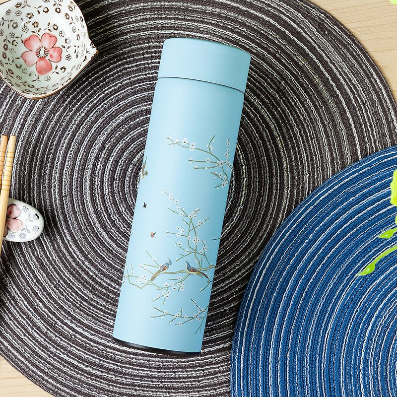 Light green thermos infuser tea