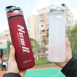 red and white sport bottle